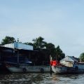 Mekong Delta Boote mit Gesichtern