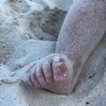 Mit Baby am Strand